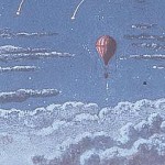 Image of a hot air balloon floating among clouds