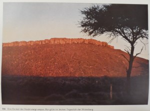 The darkness of the night ascends. Waterberg [South Africa] glows red in the last daylight.