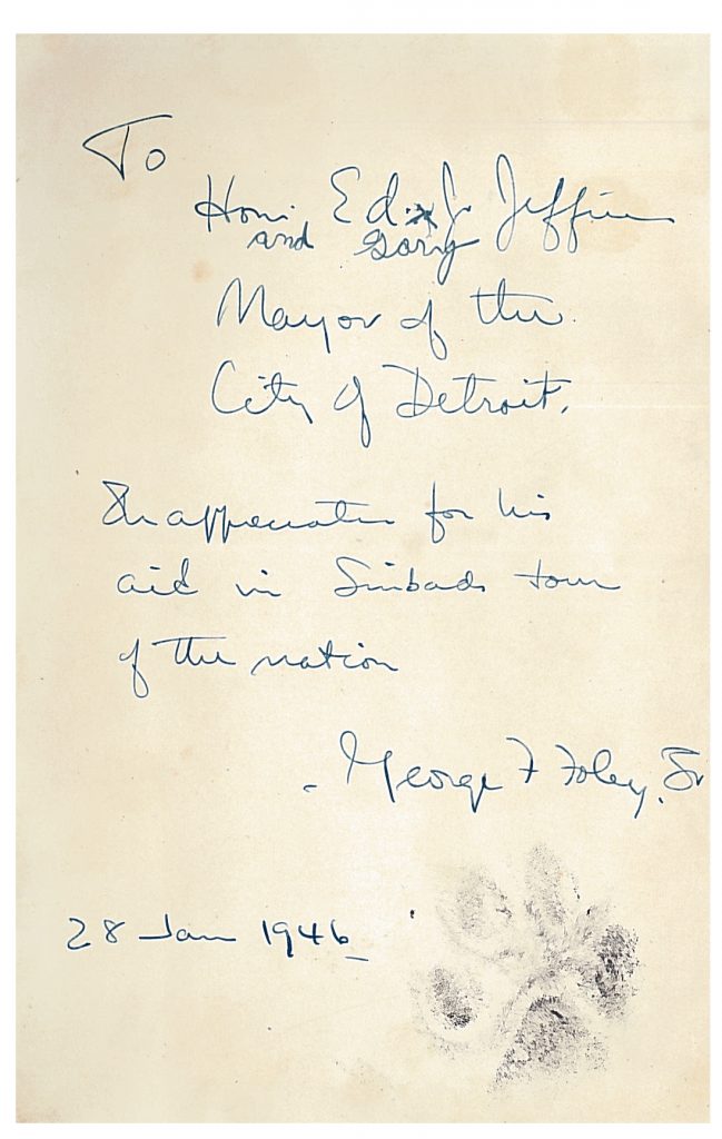 Page with signed dog print. George F. Foley Jr., Sinbad of the Coast Guard, (New York: Dodd, Mead & Company, 1945), Front Matter.    