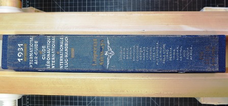 Original spine label trimmed and adhered