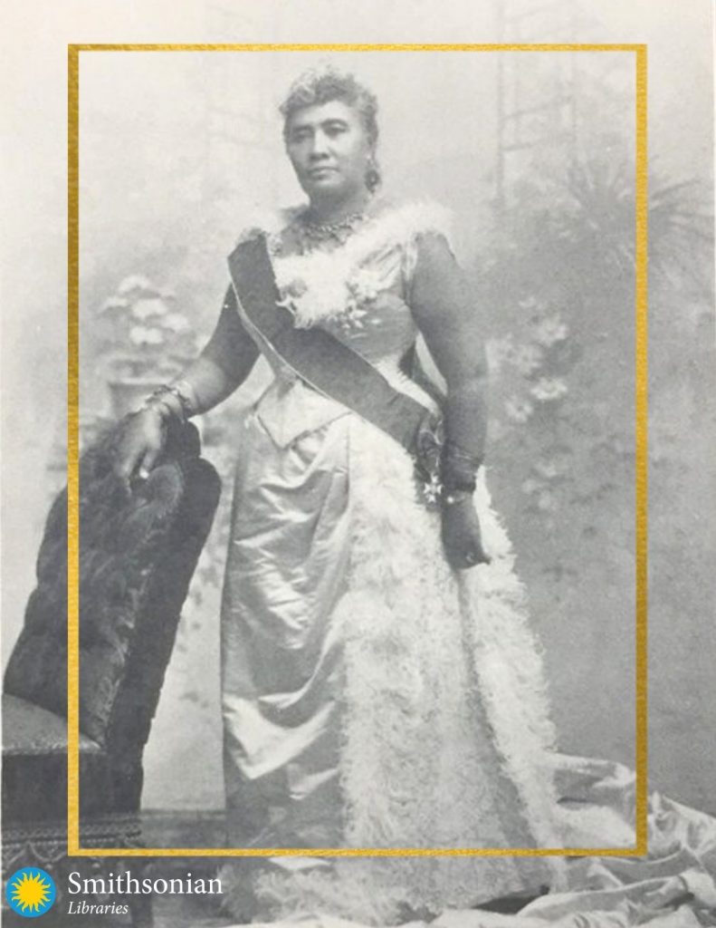 Black and white photograph of Queen Lili’uokalani, Hawaiian woman in gown with sash. 