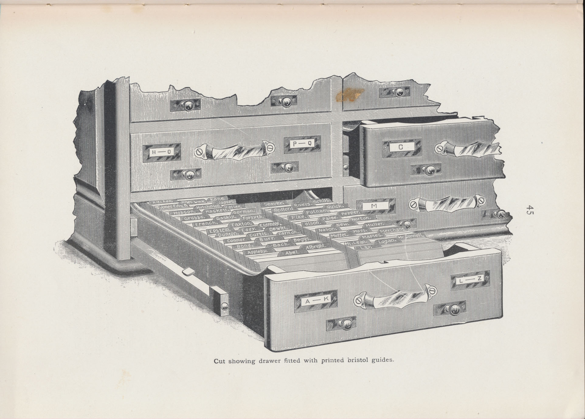 portion of card catalog with drawer of printed guides and cards