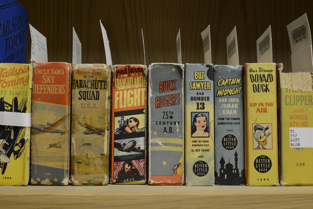 Photograph of 20th century book spines. 